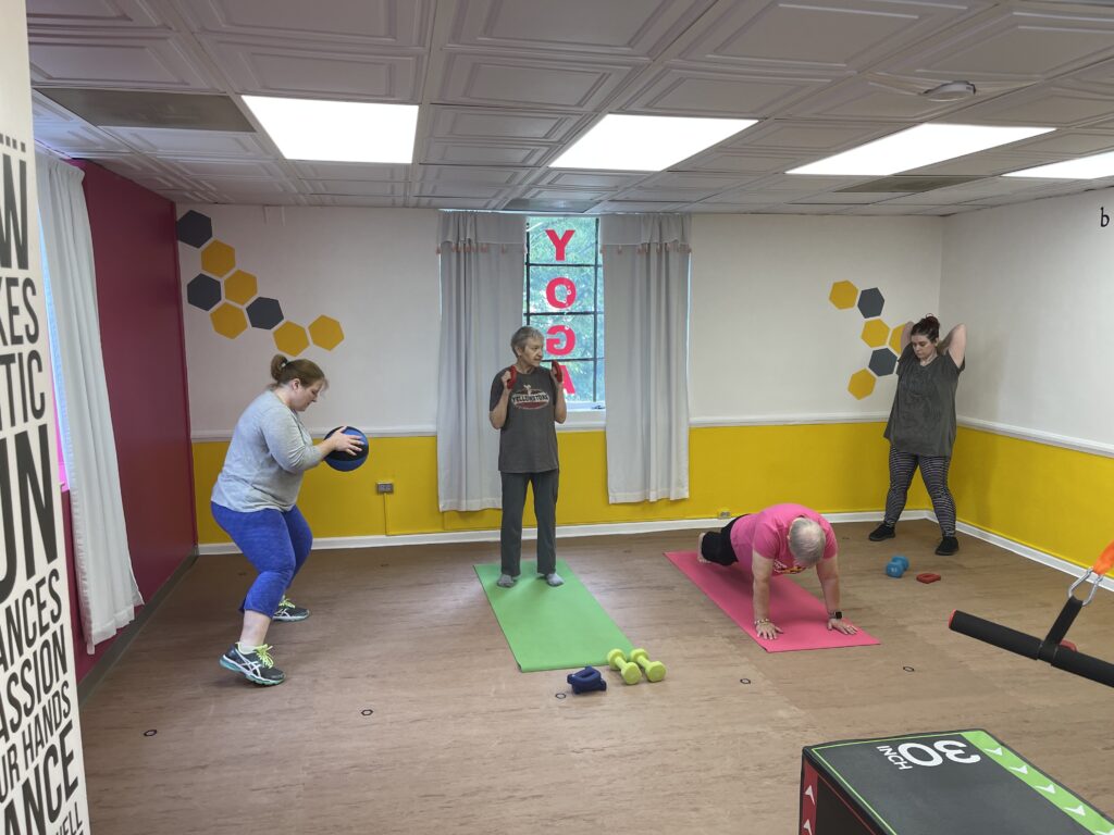 Small group personal training class at bee yoga fusion