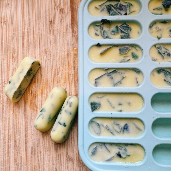 basil and olive oil frozen in ice cube trays