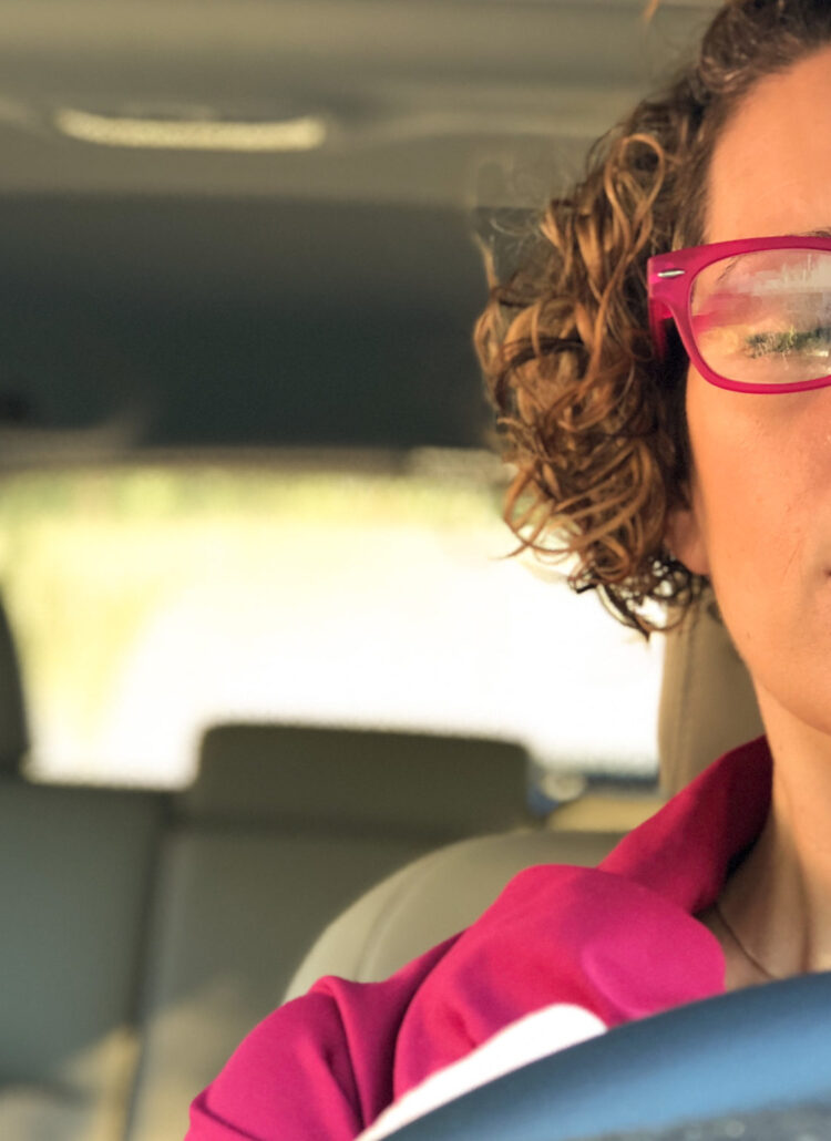 gretchen schock meditating in a parked car