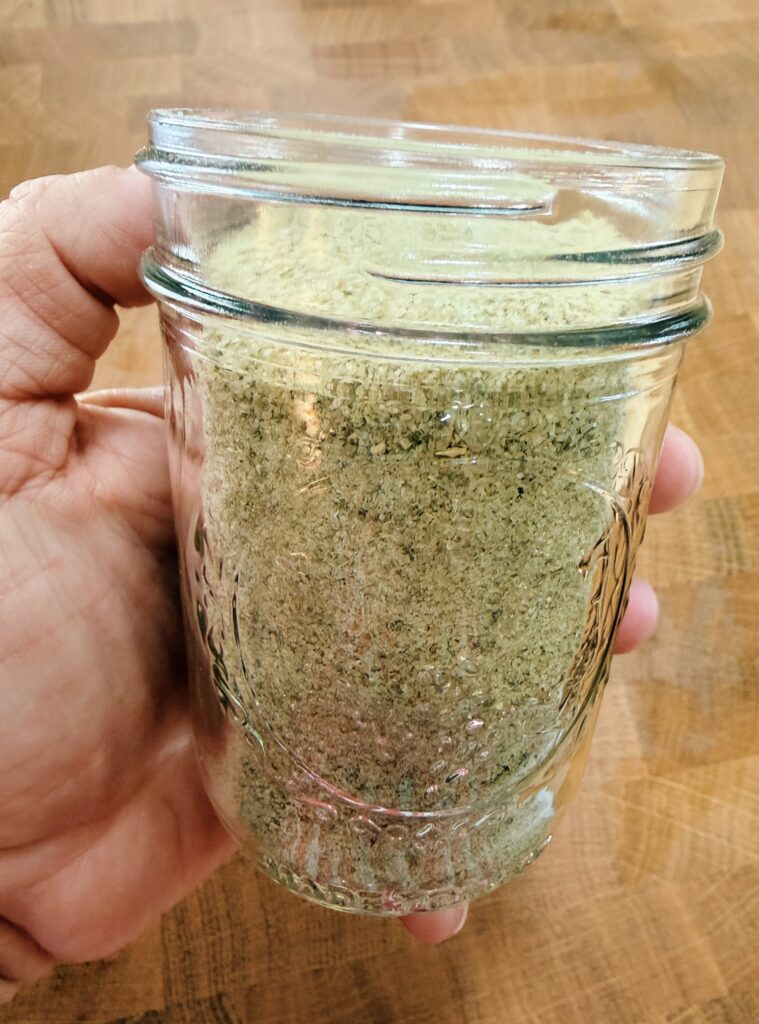basil salt in a mason jar, the finished product